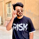 عدسة حسين علي