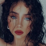 K.
