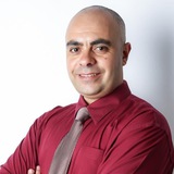 الأستاذ المترجم عزام ابو العدس